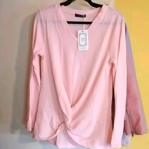 Pink long sleeve shirt with twist front